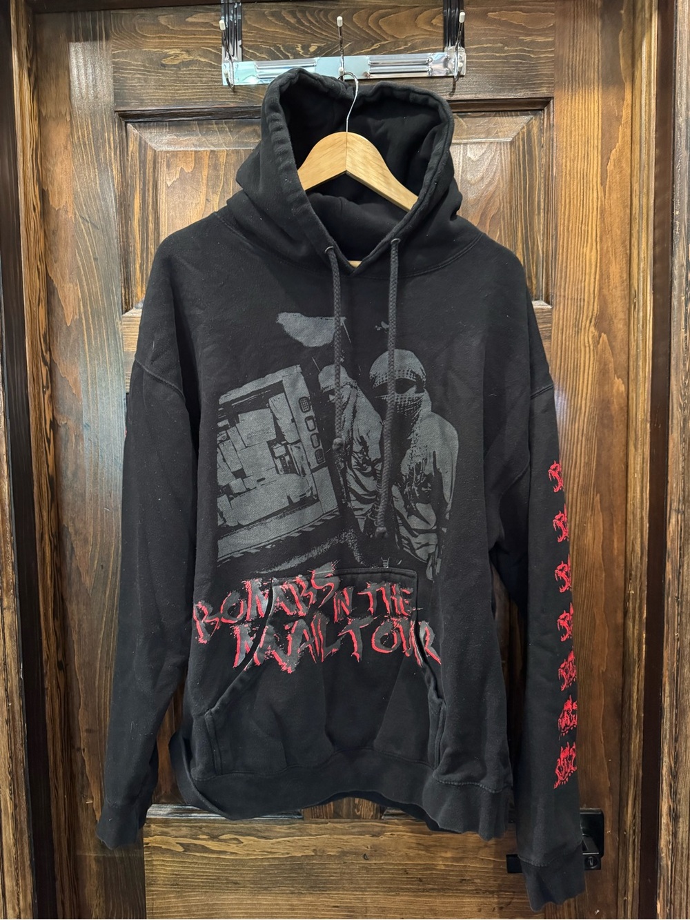 Black Graphic Tour Pullover Hoodie with Red Sleeve Accents